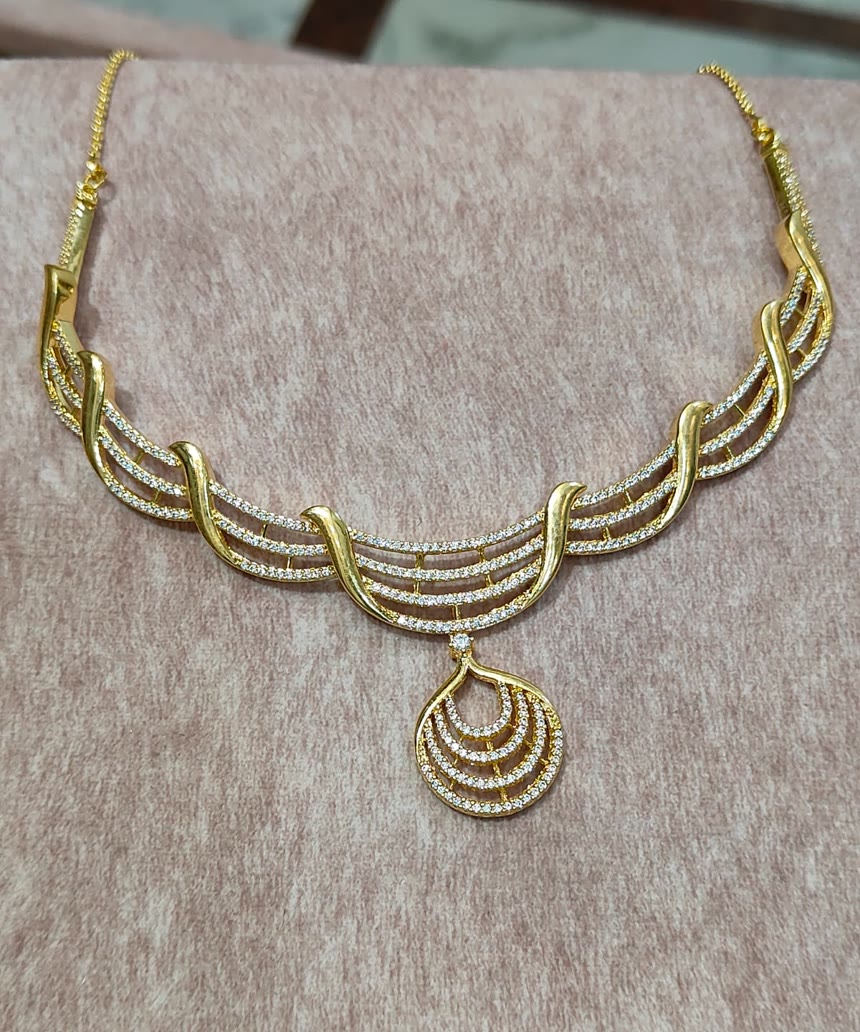Layered Diamond Necklace — Five fine strands falling to a teardrop drop. Reserve online, try it on in store.