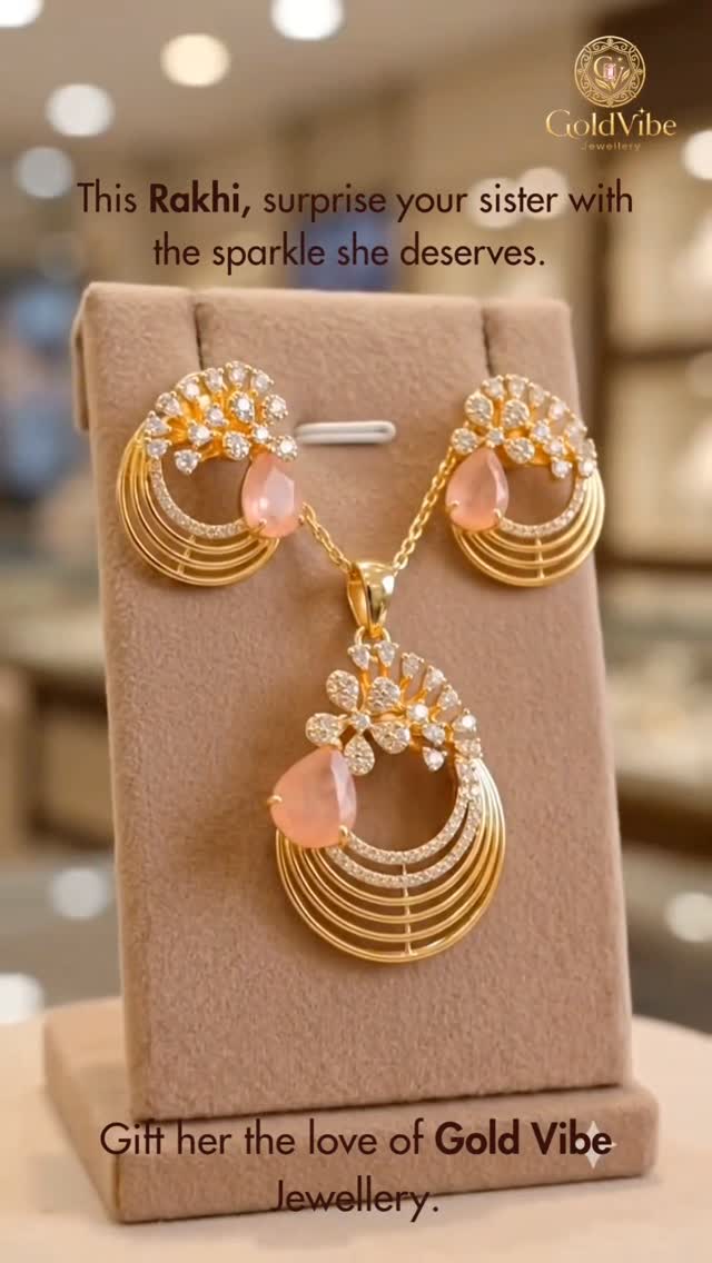 A rose-quartz pendant and earring set on a stand — this Rakhi, surprise your sister with the sparkle she deserves.